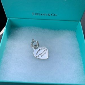 Tiffany&Co heart tag and clasping ring.
